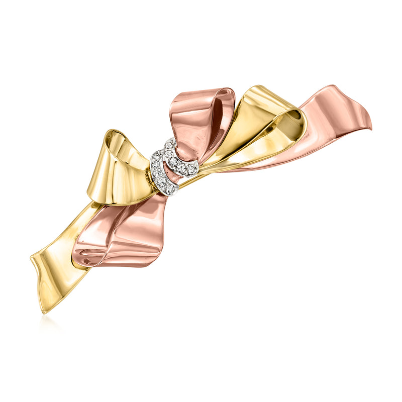 Vintage two-tone gold diamond bow pin with prong-set stones
