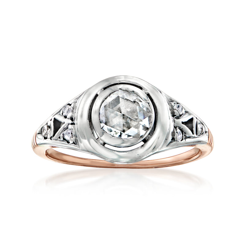 Vintage diamond ring with round center stone, silver halo, rose gold underside