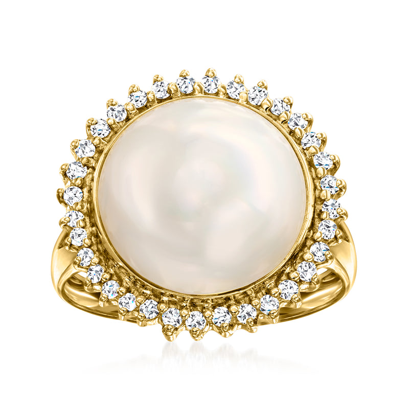 14k yellow gold ring with round mabe pearl center and diamond halo surround