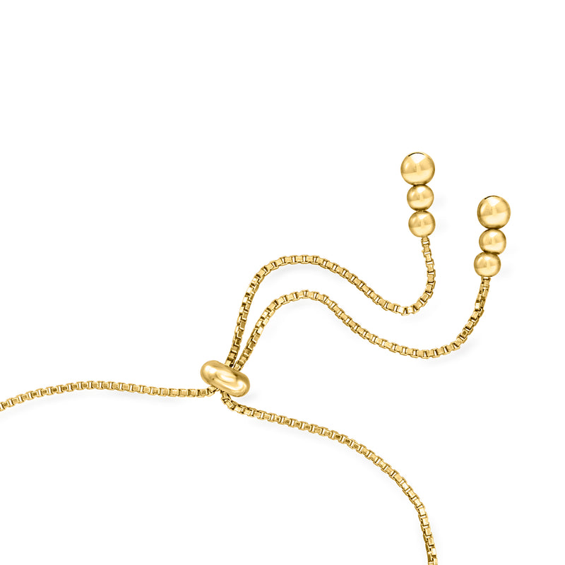 Blue sapphire tennis bolo bracelet with gold-toned chain and round sliding clasp