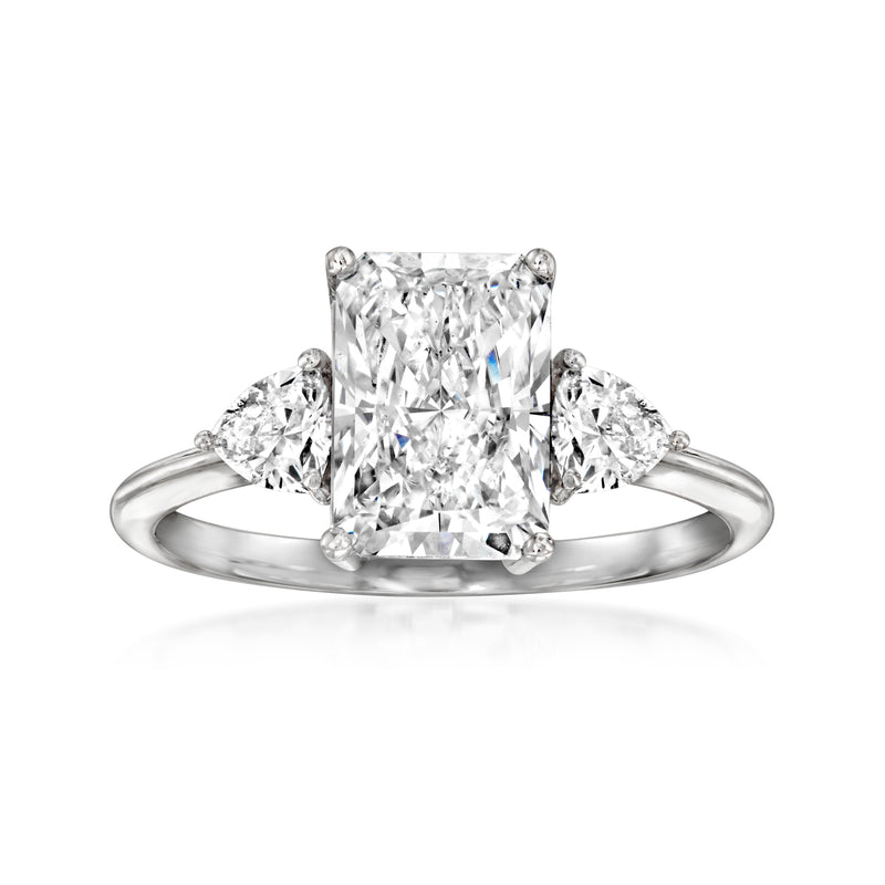Radiant and trillion-cut diamond ring in white gold with large square center stone