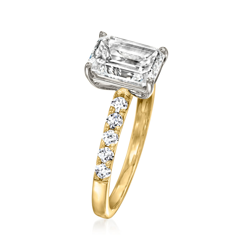 14kt yellow gold ring with emerald-cut center diamond and baguette side diamonds