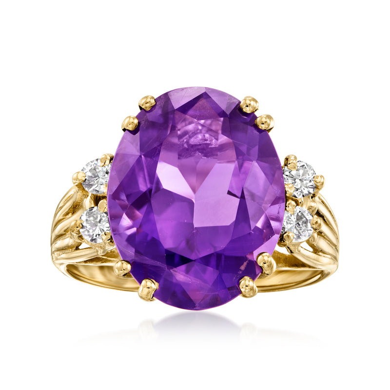 Vintage amethyst and diamond ring with oval purple amethyst center, yellow gold prongs