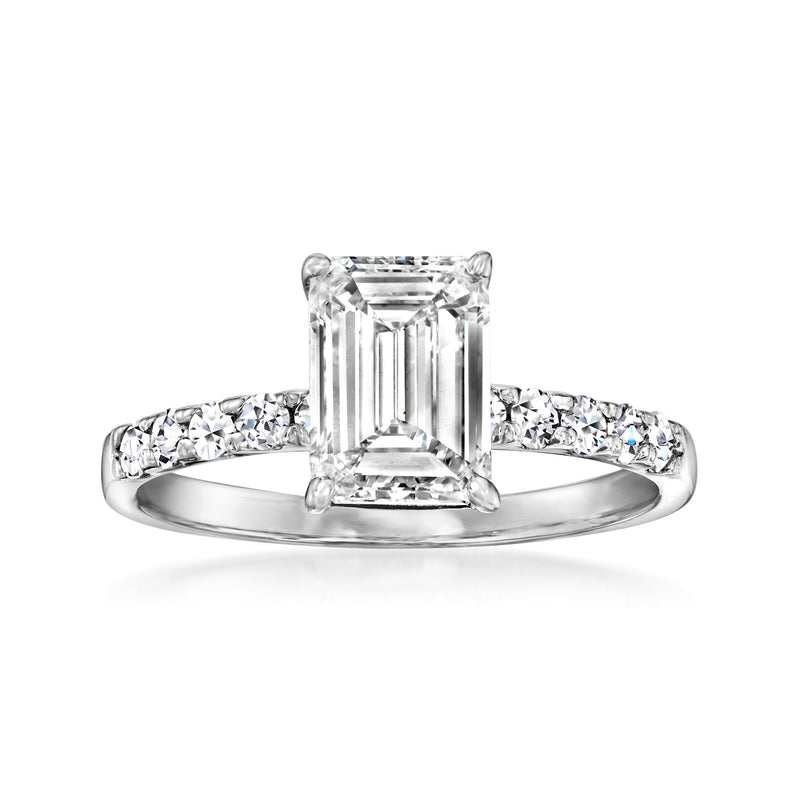 14kt white gold diamond ring with emerald-cut center stone and baguette side stones