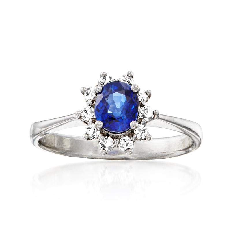 Vintage sapphire and diamond ring in 18kt white gold, blue oval center with halo