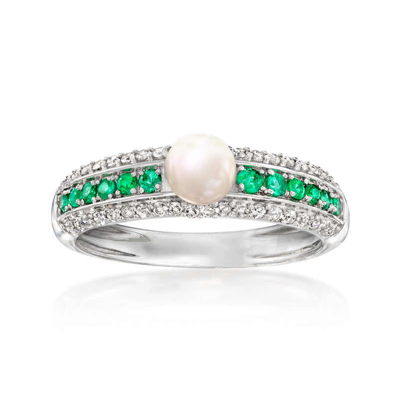 Sterling silver ring with white cultured pearl center, green gemstones, and diamond accents