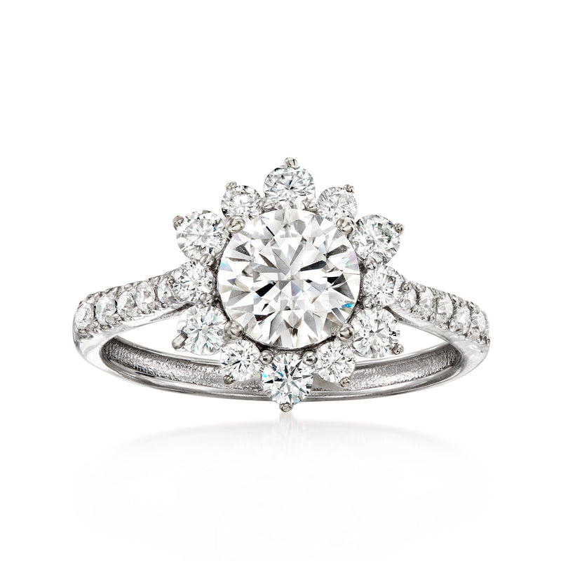 Moissanite ring in sterling silver with round center stone and floral halo
