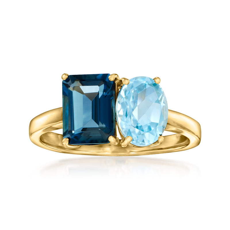 14kt yellow gold toi et moi ring with dark blue and light blue oval topaz