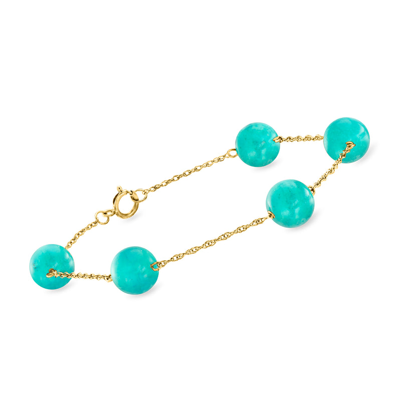 Turquoise bead station bracelet with 14kt yellow gold chain and round green stones