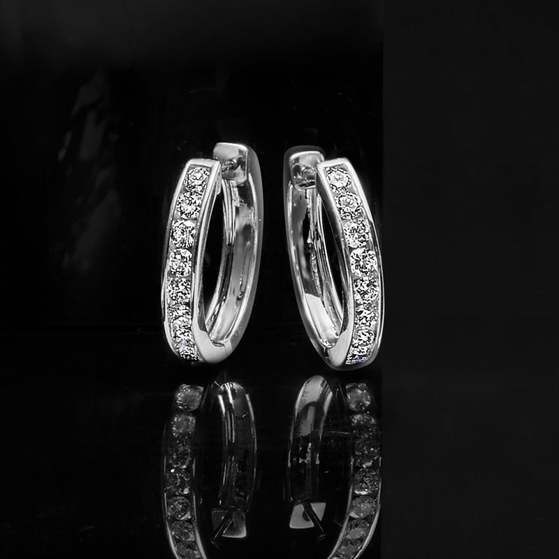 14kt white gold channel-set diamond hoop earrings, oval hoops with sparkling stones