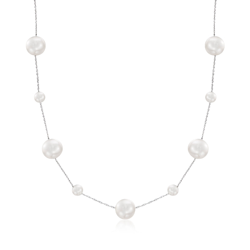 Cultured pearl station necklace with round white pearls on 14kt white gold chain