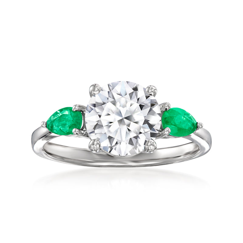 14kt white gold ring with round lab-grown diamond and green emerald side stones