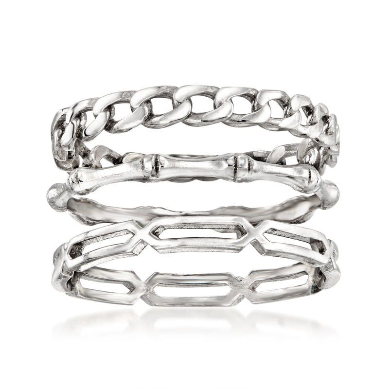 Sterling silver ring set with three stacked bands and linked geometric cutout design