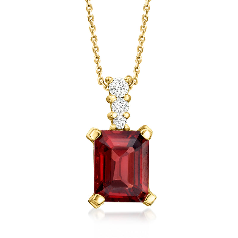 14kt yellow gold garnet pendant necklace with red square-cut gemstone and diamond clusters