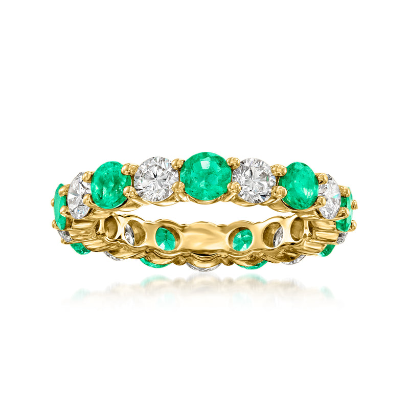 14kt yellow gold eternity band with green oval stones and clear round diamonds