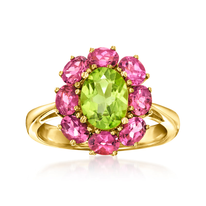 14kt yellow gold ring with oval peridot center and pink topaz halo cluster