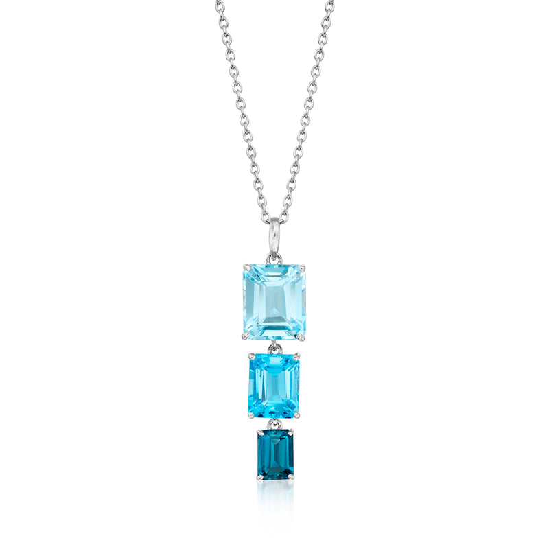 Sterling silver pendant necklace with three rectangular blue topaz stones, link chain