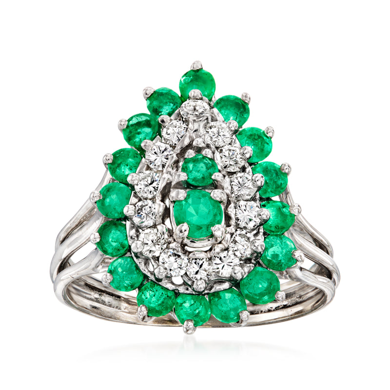 Vintage emerald and diamond cluster ring in 14kt white gold, rounded center with green stones