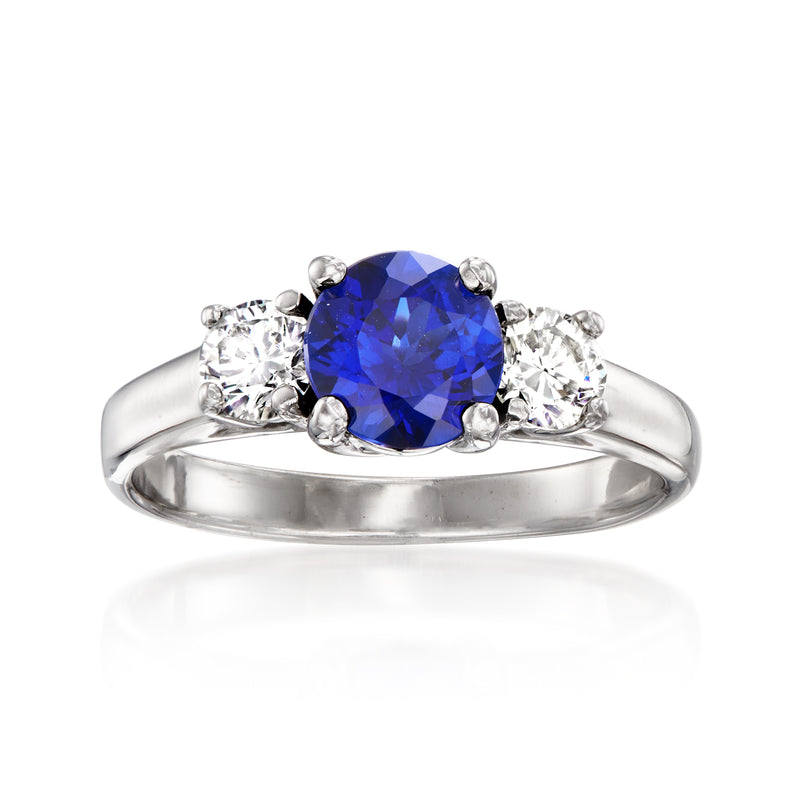 Vintage sapphire and diamond ring in 14kt white gold, oval blue center with round side stones
