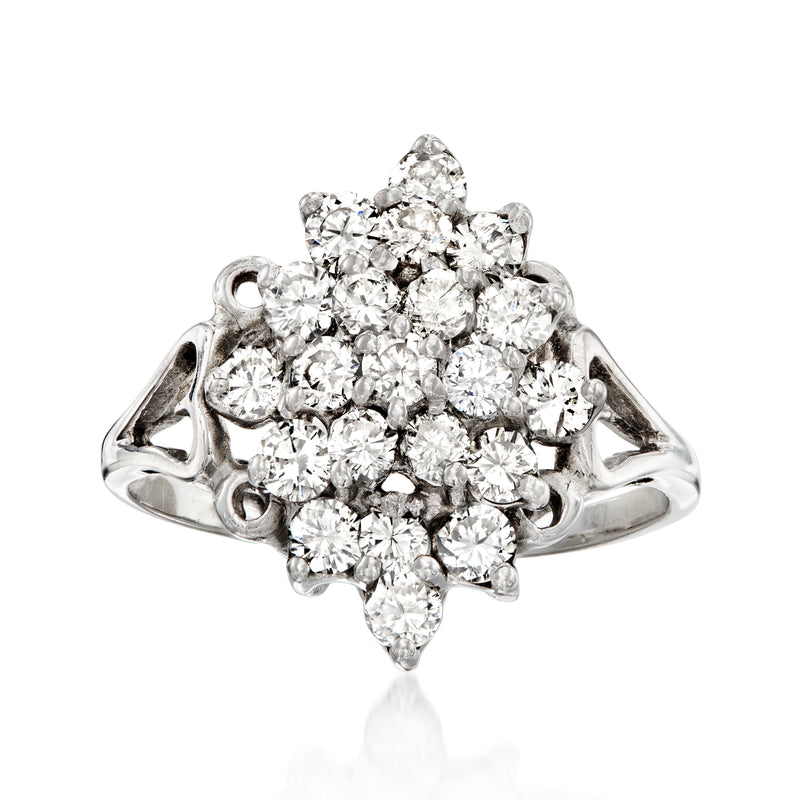 Vintage diamond cluster ring in white gold with multiple round-cut stones