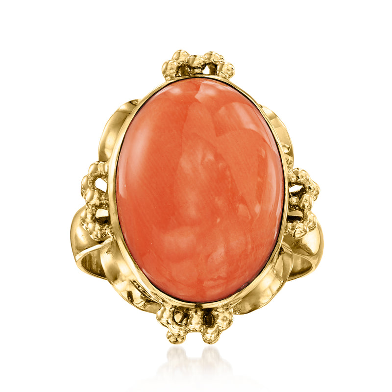 Vintage coral cabochon ring in 18kt yellow gold, oval stone with ornate bezel
