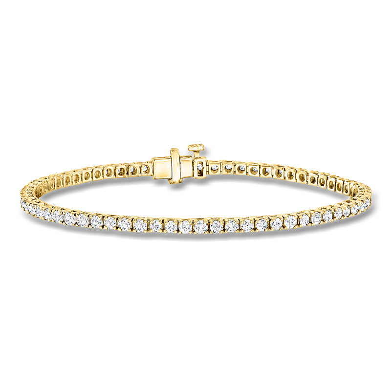 Gold tennis bracelet with round lab-grown diamonds in a continuous row, hinged clasp