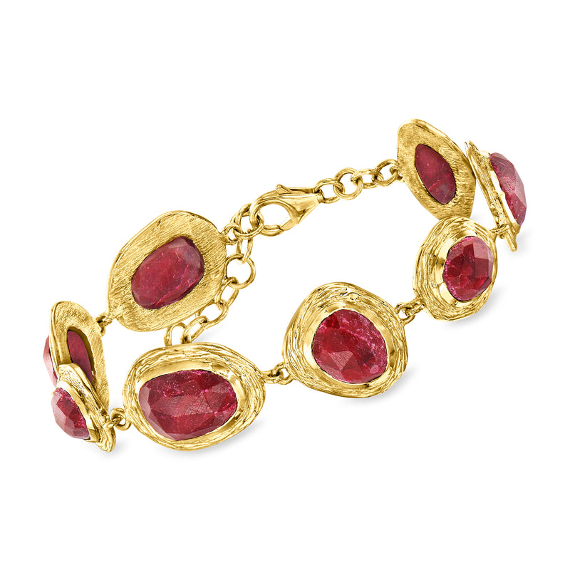 18kt gold over sterling ruby bracelet with oval and round red gemstones, link chain
