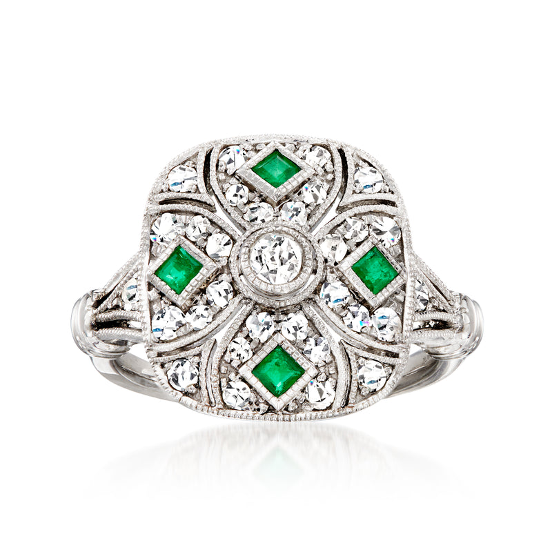 Platinum vintage ring with round diamonds and square green emerald accents