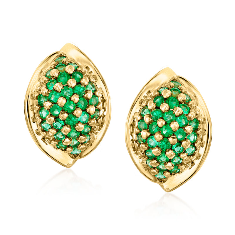 Curved oval gold earrings with green gemstone cluster