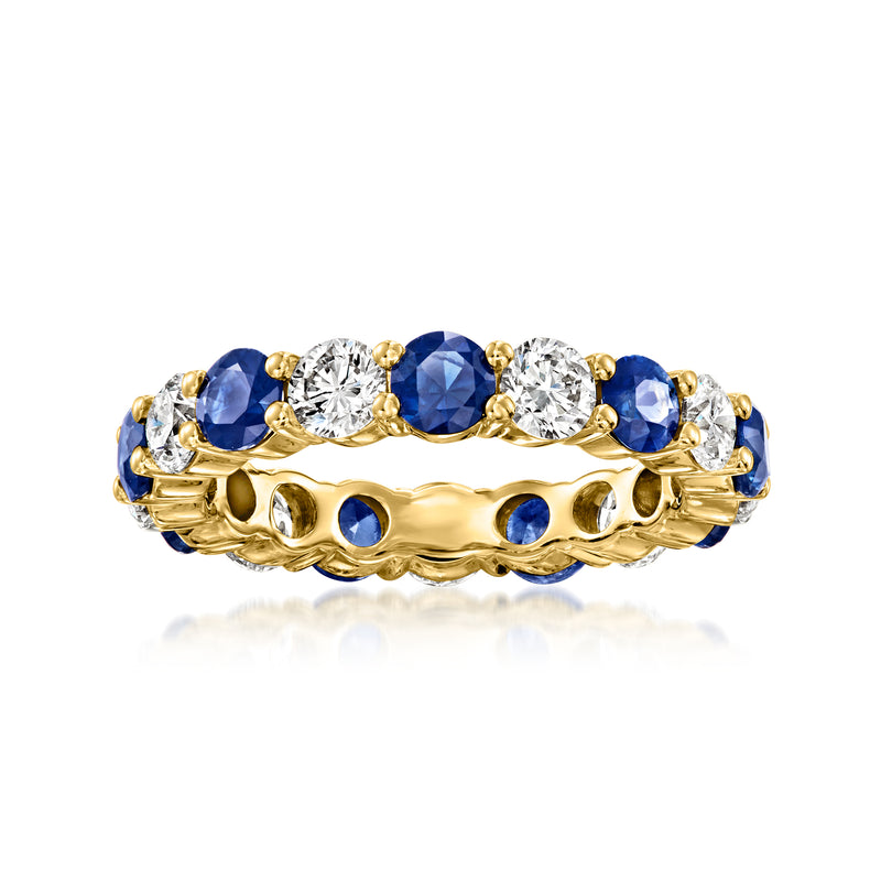 14kt yellow gold eternity band with blue sapphires and diamond accents