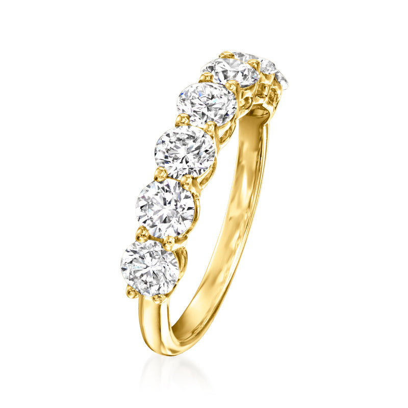 Seven-stone diamond band ring in 14kt yellow gold, side view with round prong-set stones
