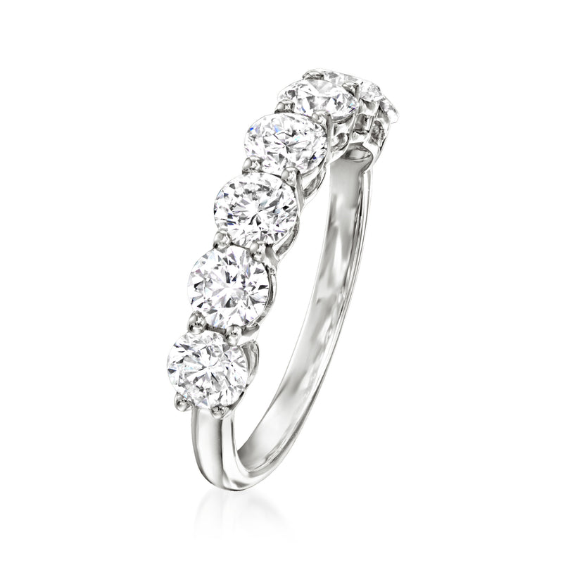 Seven-stone diamond ring in 14k white gold, side view of raised round stones