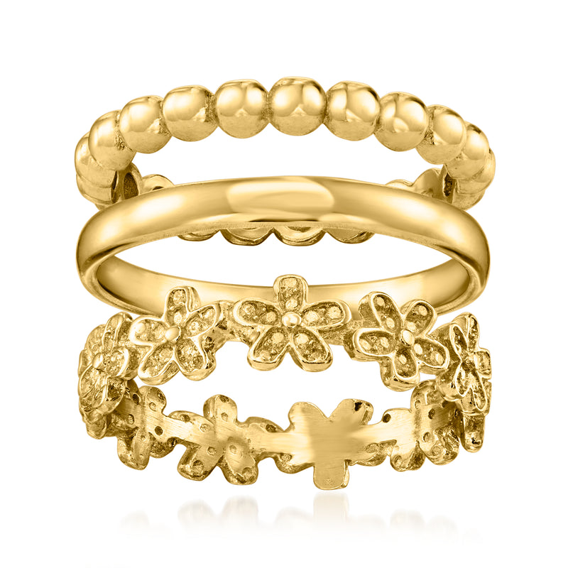 Gold over sterling three-ring set: bead-textured, smooth, and floral openwork bands