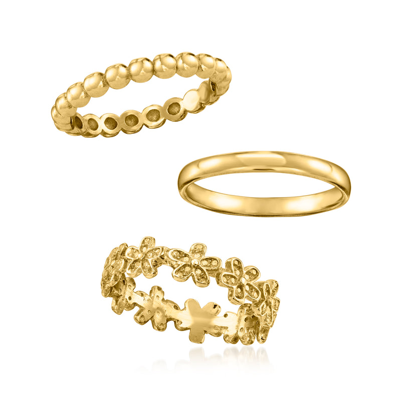 Gold over sterling ring set: beaded band, smooth band, and floral openwork band