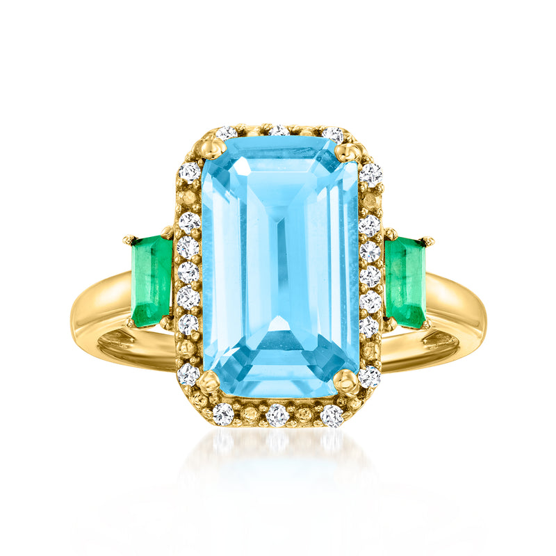 14kt yellow gold ring with rectangular Swiss blue topaz, green emerald sides, diamond halo