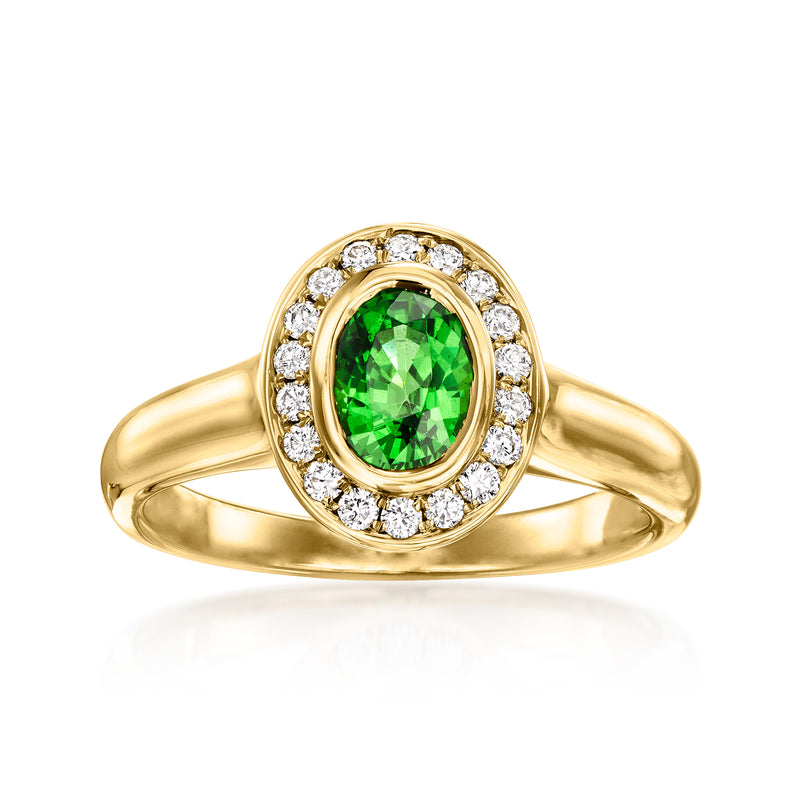 14kt yellow gold ring with oval green tsavorite center and diamond halo