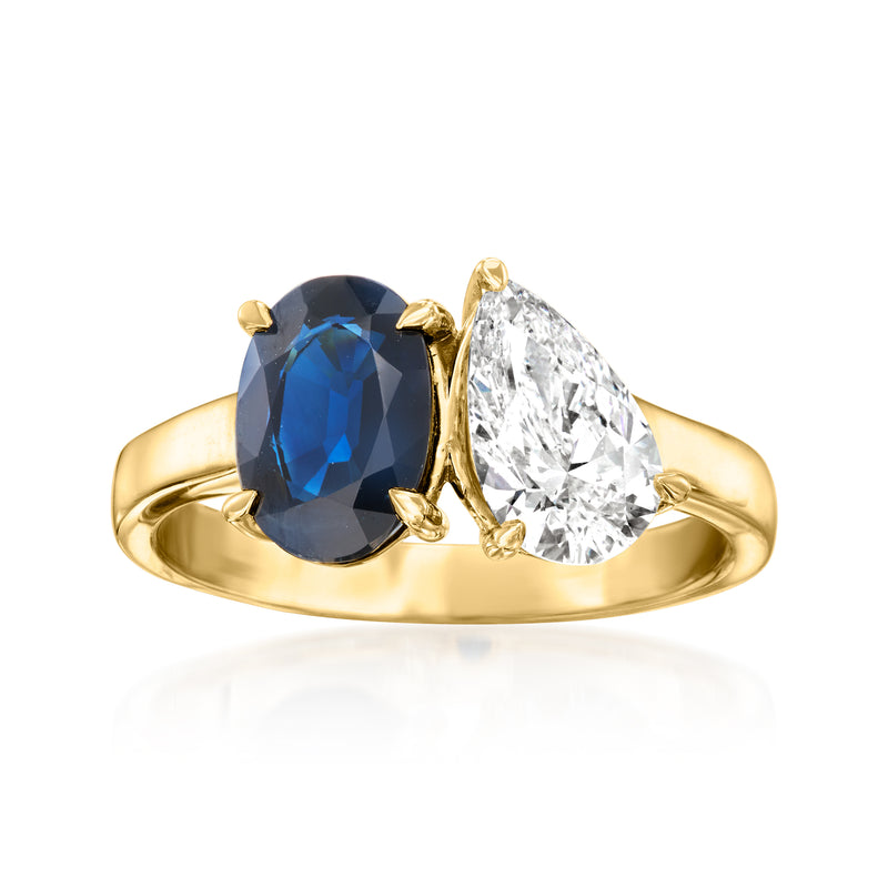 14kt yellow gold toi et moi ring with oval dark blue sapphire and round diamond