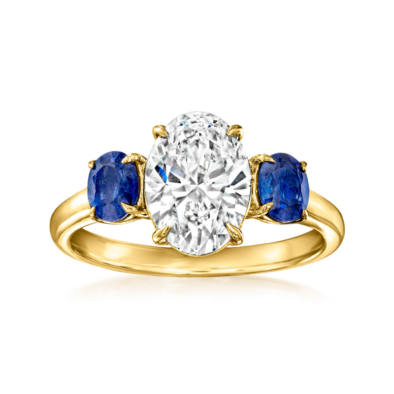 14kt yellow gold ring with round lab-grown diamond and blue sapphire side stones