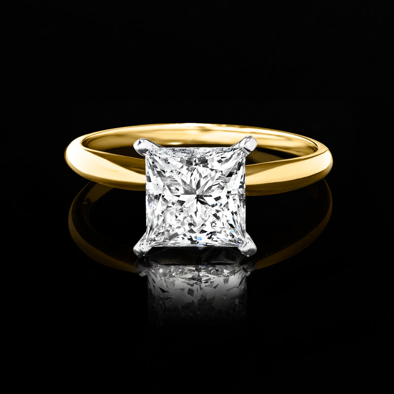 14kt yellow gold solitaire ring with princess-cut diamond center stone
