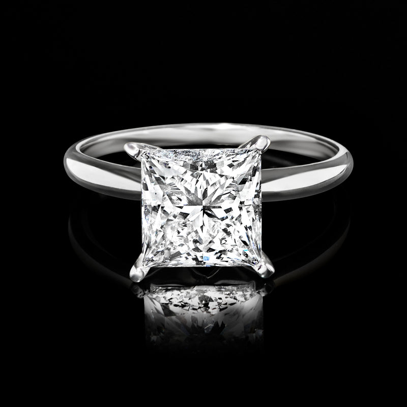Princess-cut diamond solitaire ring with square center stone in 14kt white gold