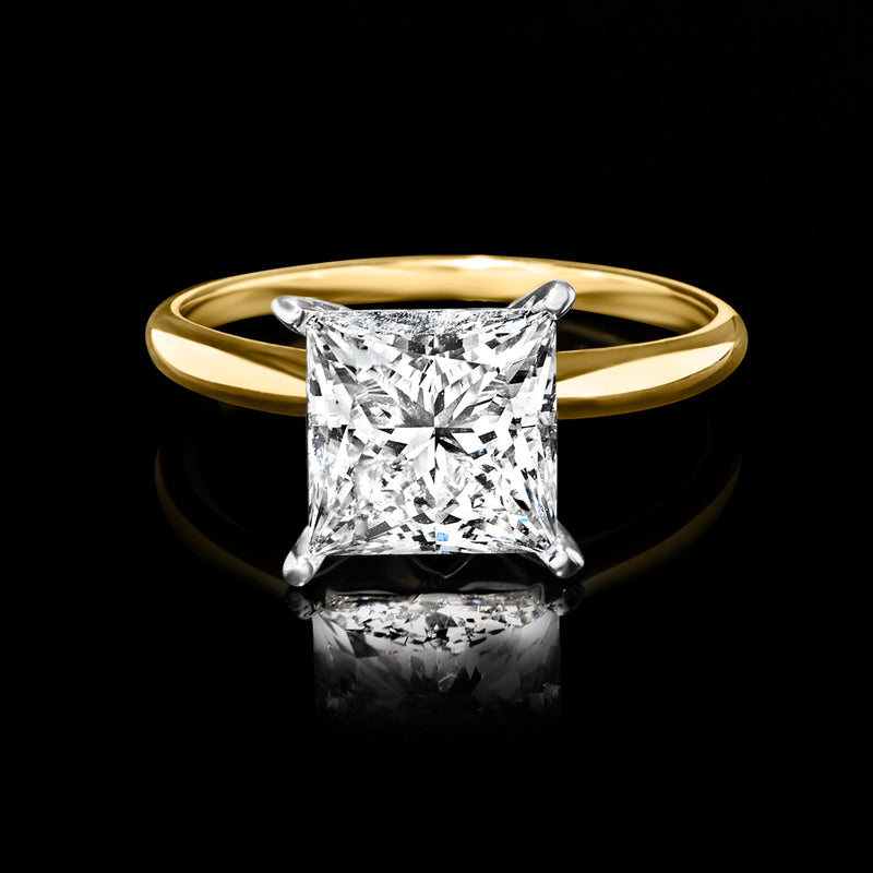 Princess-cut diamond solitaire ring with square stone in 14kt yellow gold, angled view
