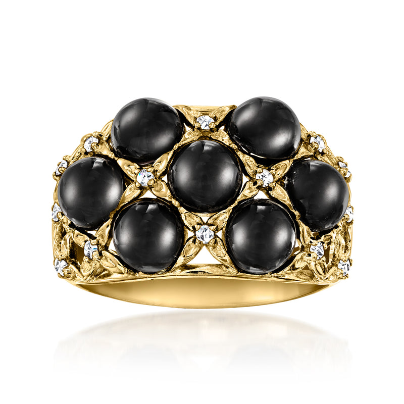Gold ring with oval black onyx-style stones and clear diamond accents