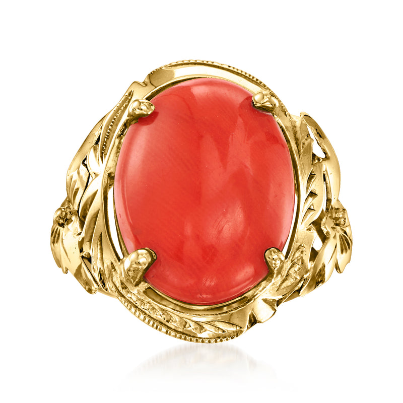 Vintage coral ring in 12kt yellow gold with oval red cabochon and engraved shoulders