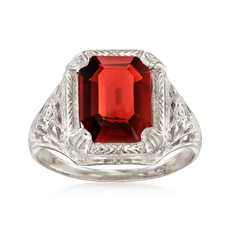 White gold filigree ring with large red rectangular faceted garnet center stone