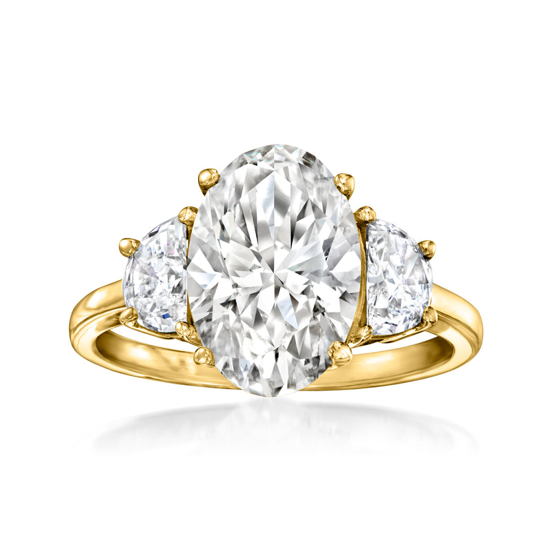 14kt yellow gold diamond ring with oval center and half-moon side stones