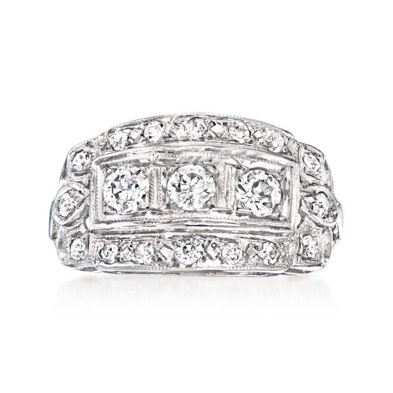 Vintage 14kt white gold diamond ring with three-center stone panel and pavé side stones