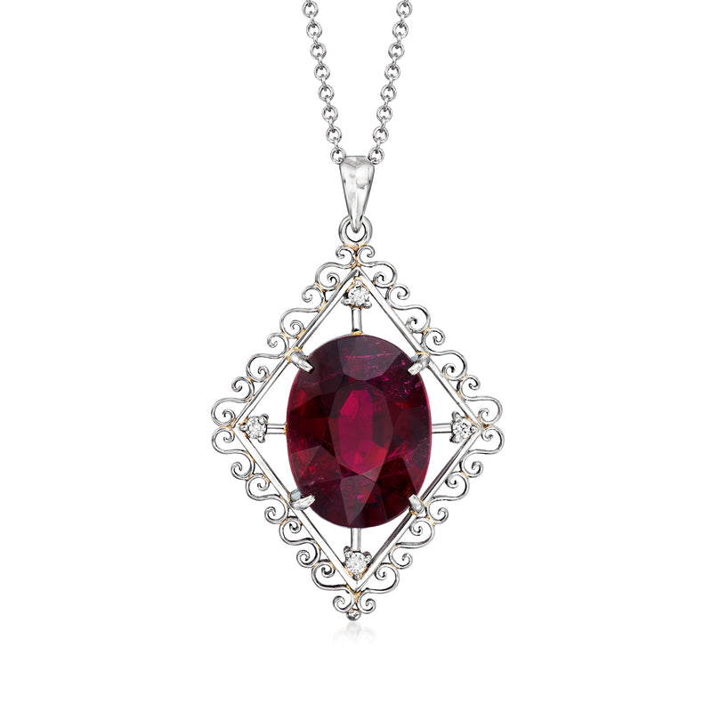 Pendant necklace with oval deep red gemstone, diamond accents, and filigree setting