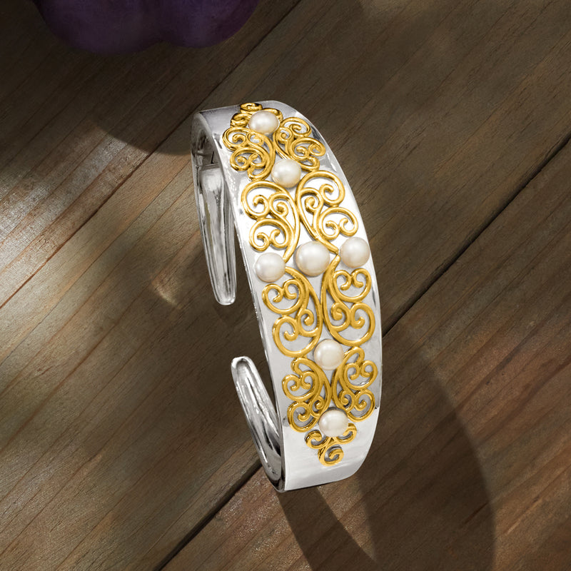 Two-tone sterling silver pearl cuff bracelet, side view with gold scrollwork and beads