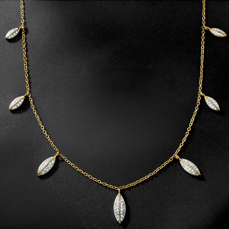 Gold-toned necklace with marquise diamond oval drop stations and center drop pendant
