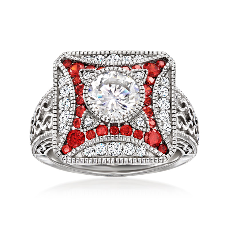 Sterling silver ring with round clear center, red simulated gems, engraved side details